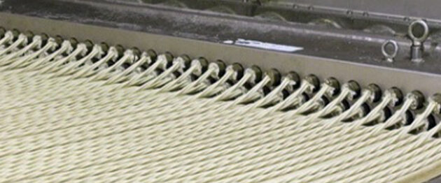 Pretzel extruder machine and conveyor belt.
